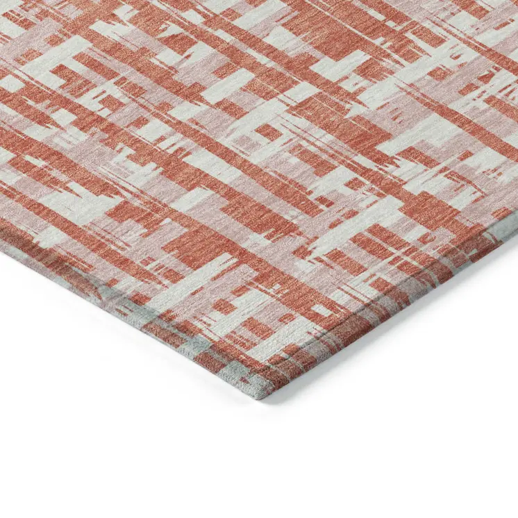 10' X 14' Coral Pink And Ivory Abstract Washable Indoor Outdoor Area Rug