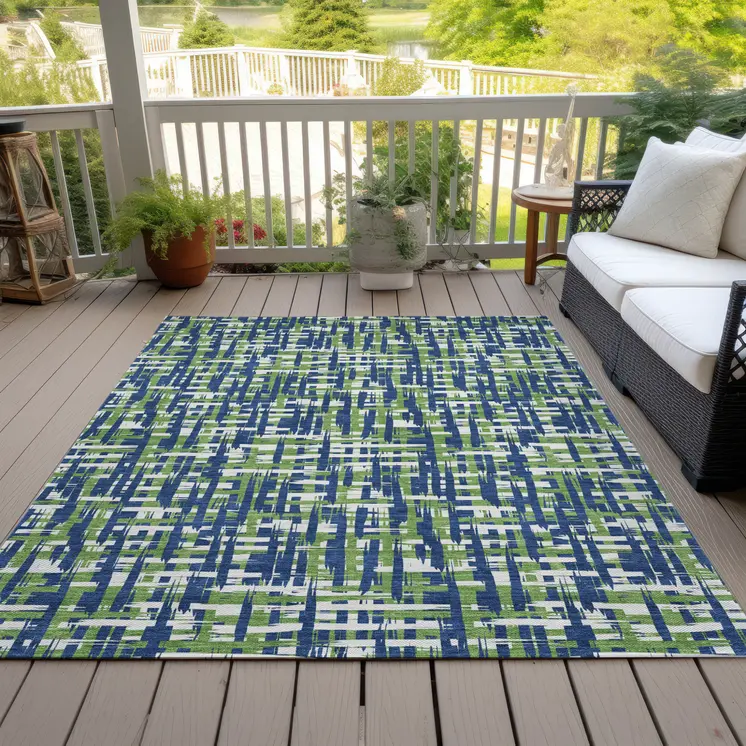 10' X 14' Navy Blue Green And Ivory Abstract Washable Indoor Outdoor Area Rug