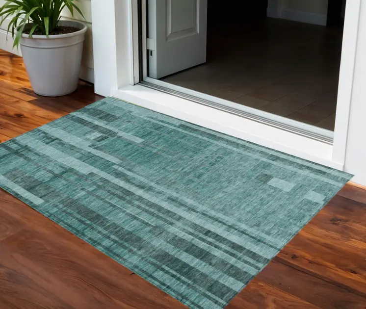 5' X 8' Teal Blue And Black Striped Washable Indoor Outdoor Area Rug