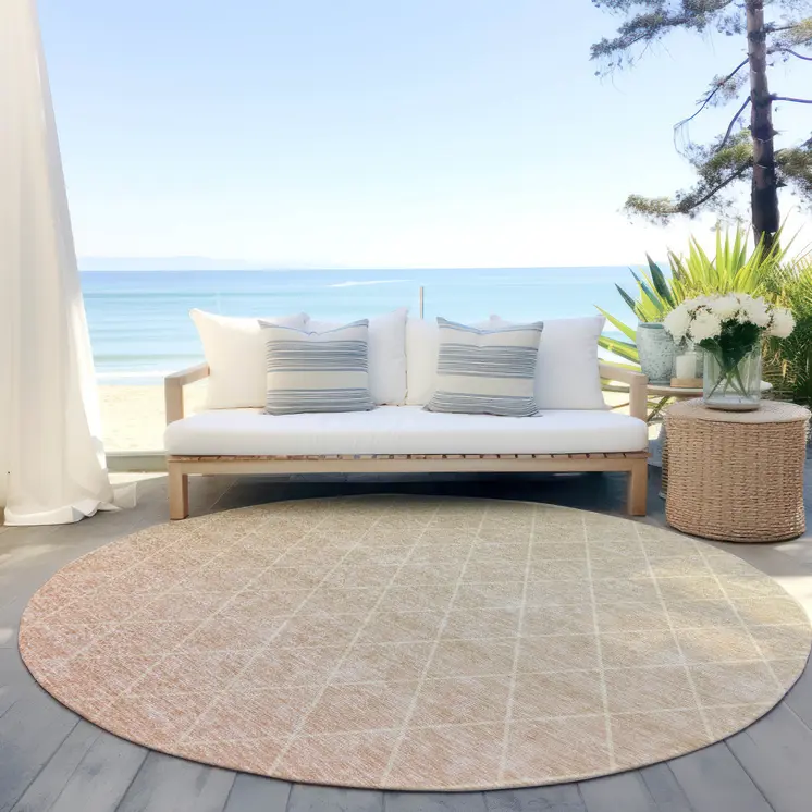 8' Salmon And Beige Round Geometric Washable Indoor Outdoor Area Rug