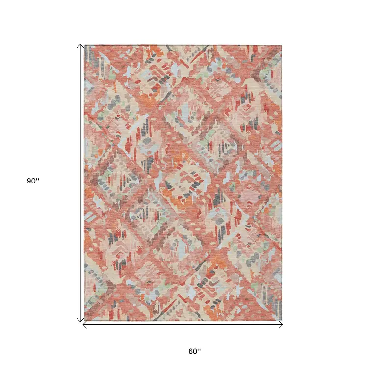 5' X 8' Coral And Orange Geometric Washable Indoor Outdoor Area Rug