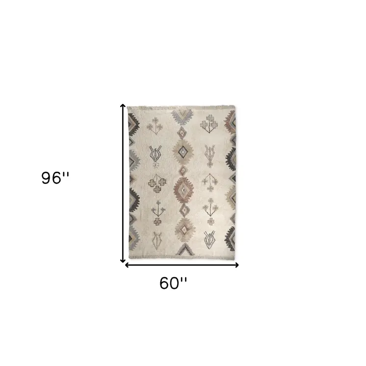 5' X 8' Beige And Brown Tribal Hand Woven Area Rug With Fringe