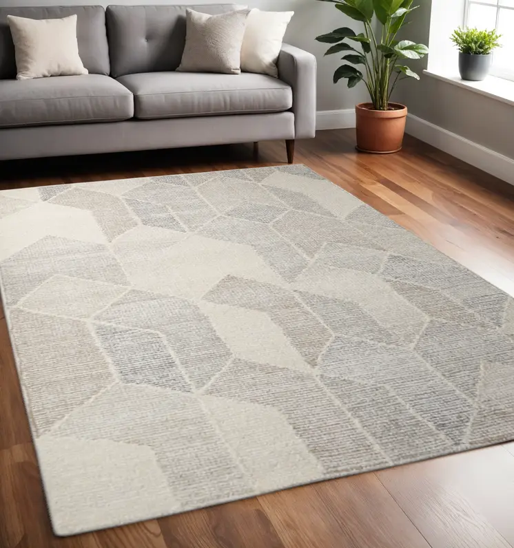 5' X 8' Beige Gray And Ivory Wool Geometric Hand Woven Area Rug