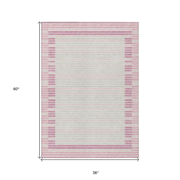 3' X 5' Pink And Ivory Striped Washable Indoor Outdoor Area Rug