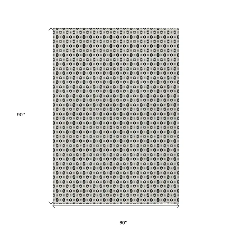 5' X 8' Ivory And Black Floral Washable Indoor Outdoor Area Rug