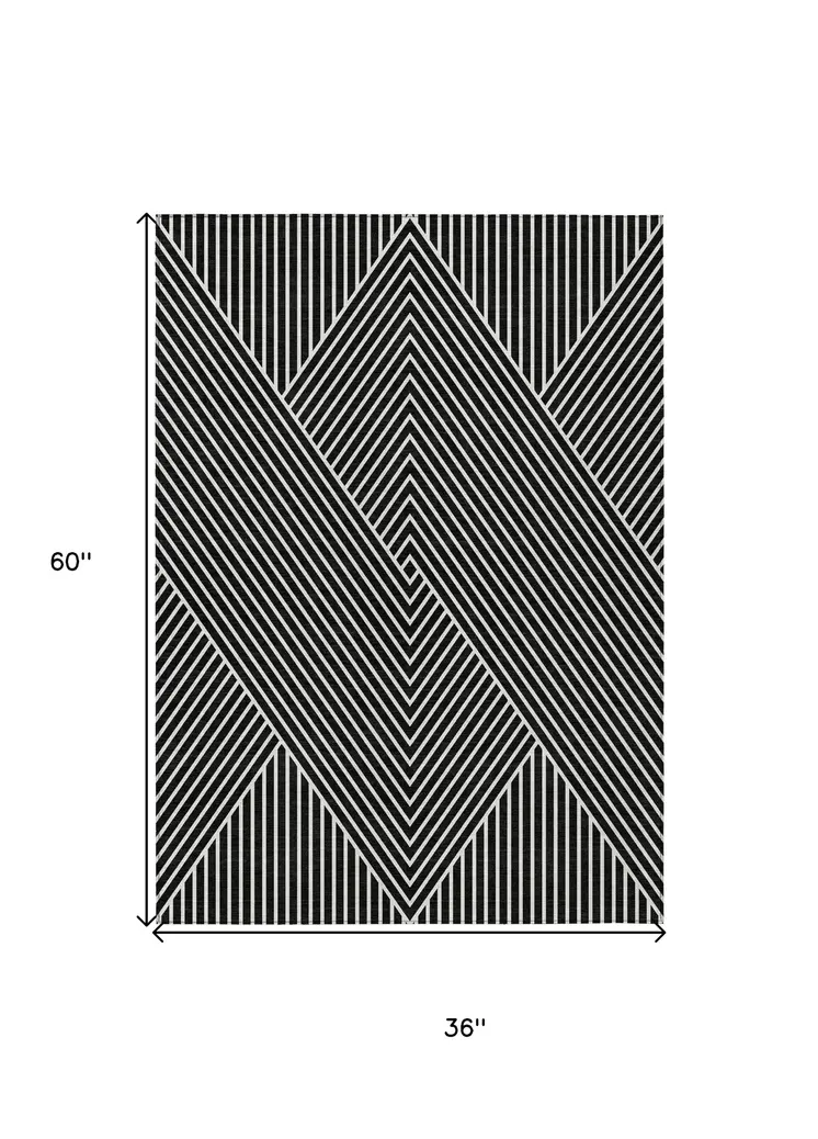 3' X 5' Black And Ivory Geometric Washable Indoor Outdoor Area Rug