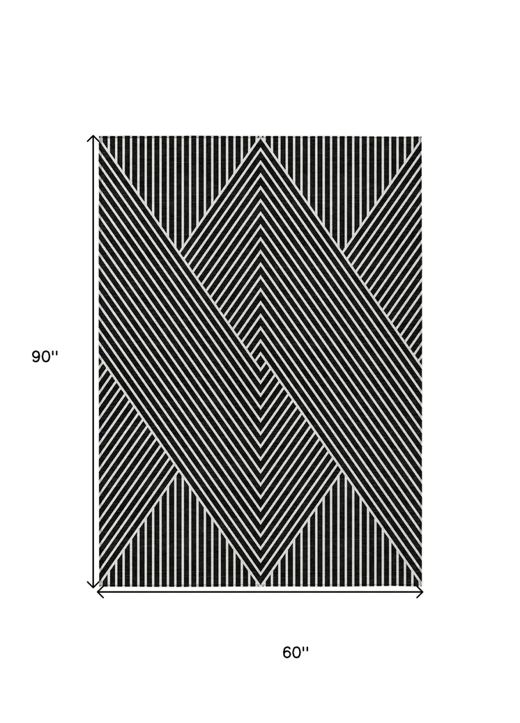 5' X 8' Black And Ivory Geometric Washable Indoor Outdoor Area Rug