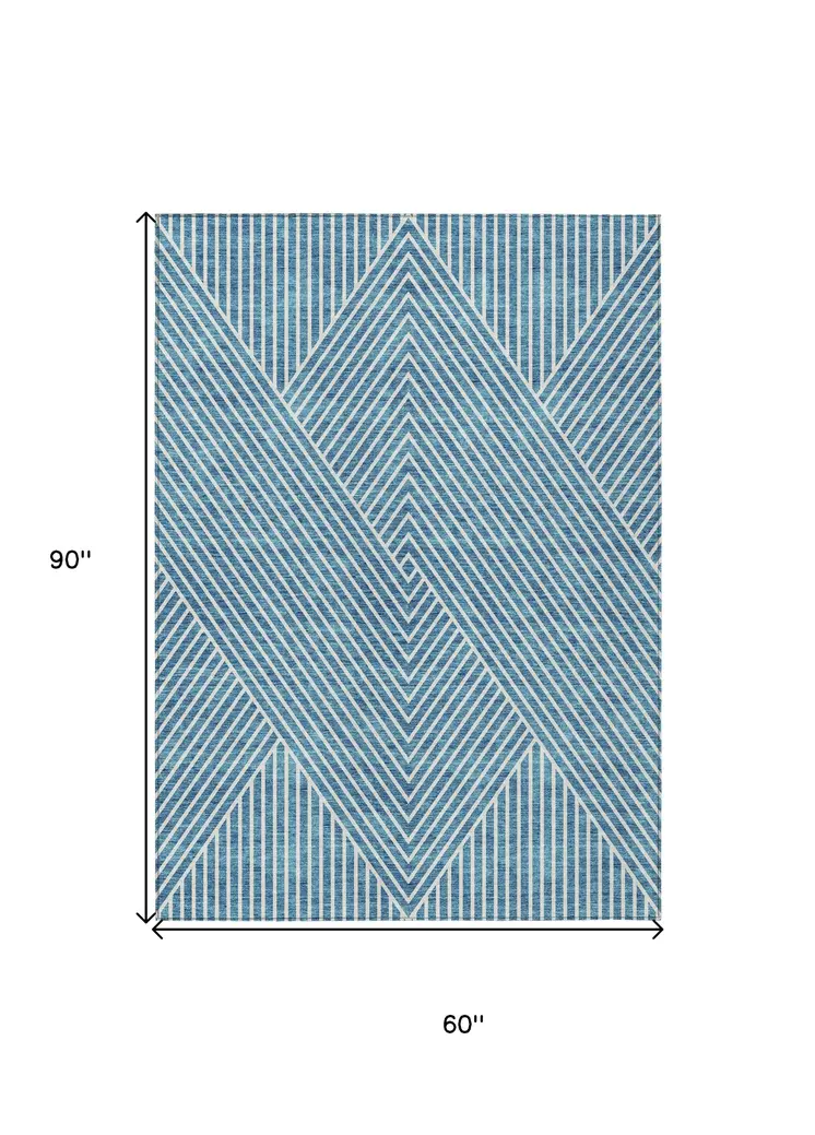 5' X 8' Teal Blue And Ivory Geometric Washable Indoor Outdoor Area Rug