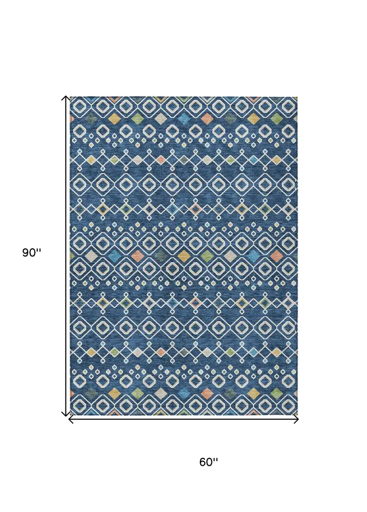 5' X 8' Navy Blue Ivory And Peach Geometric Washable Indoor Outdoor Area Rug