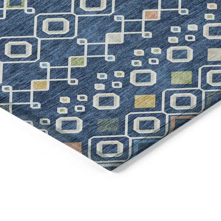 9' X 12' Navy Blue Ivory And Peach Geometric Washable Indoor Outdoor Area Rug