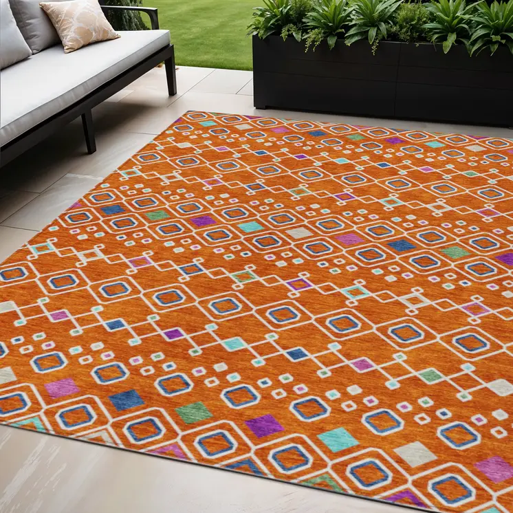5' X 8' Orange Blue And Purple Geometric Washable Indoor Outdoor Area Rug