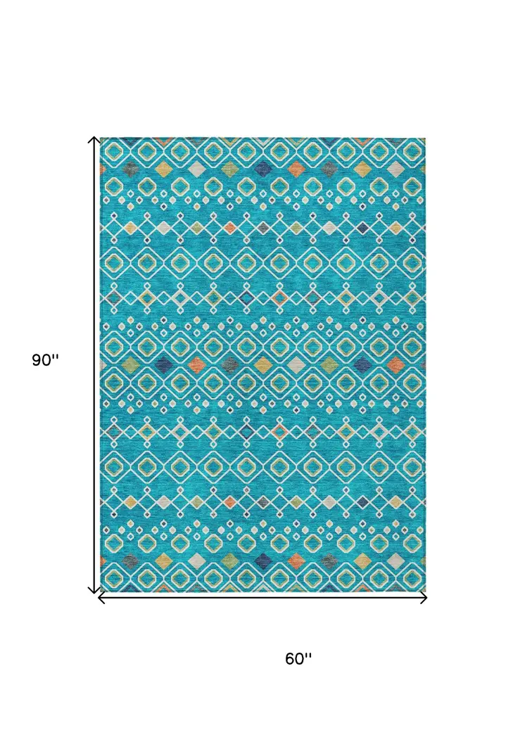 5' X 8' Teal Blue Ivory And Gold Geometric Washable Indoor Outdoor Area Rug
