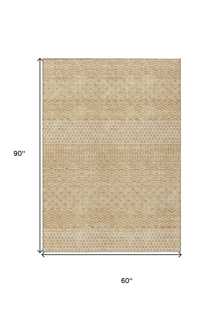5' X 8' Gold And Ivory Chevron Washable Indoor Outdoor Area Rug