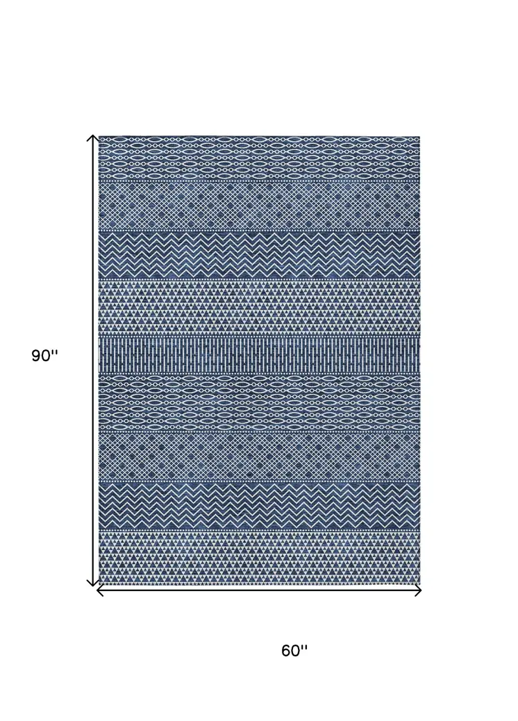 5' X 8' Navy Blue And Ivory Chevron Washable Indoor Outdoor Area Rug