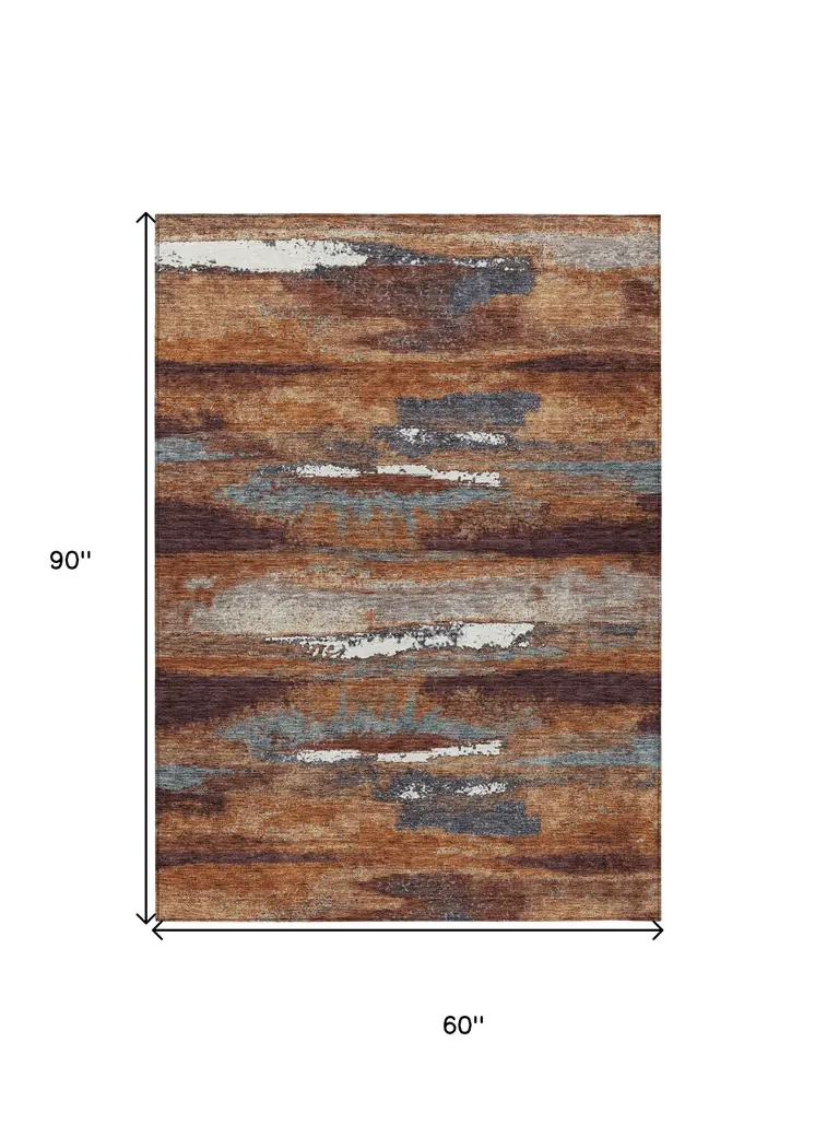 5' X 8' Copper Rust And Ivory Abstract Washable Indoor Outdoor Area Rug