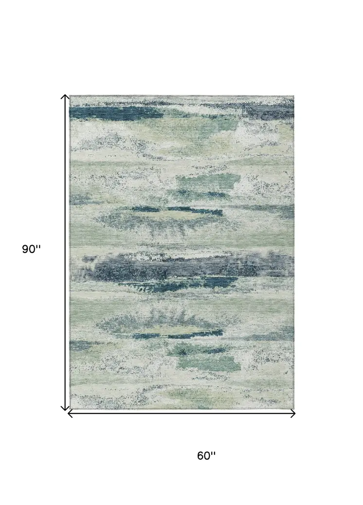 5' X 8' Mint Green Ivory And Denim Blue Abstract Washable Indoor Outdoor Area Rug