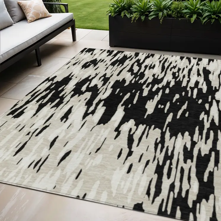 5' X 8' Black And Ivory Abstract Washable Indoor Outdoor Area Rug
