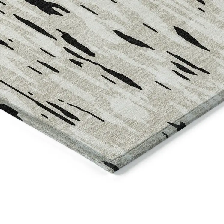 5' X 8' Black And Ivory Abstract Washable Indoor Outdoor Area Rug
