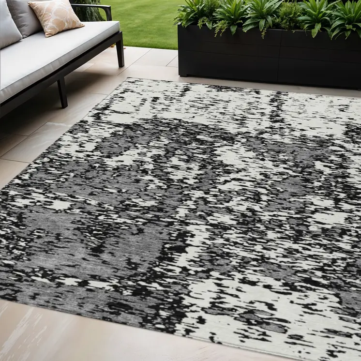 5' X 8' Black And Ivory Abstract Washable Indoor Outdoor Area Rug