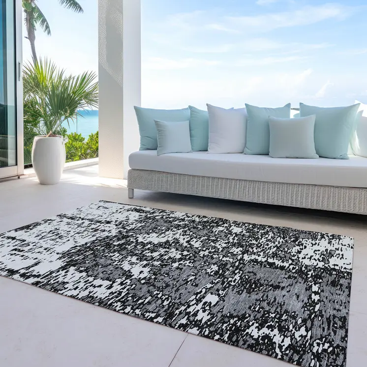 5' X 8' Black And Ivory Abstract Washable Indoor Outdoor Area Rug