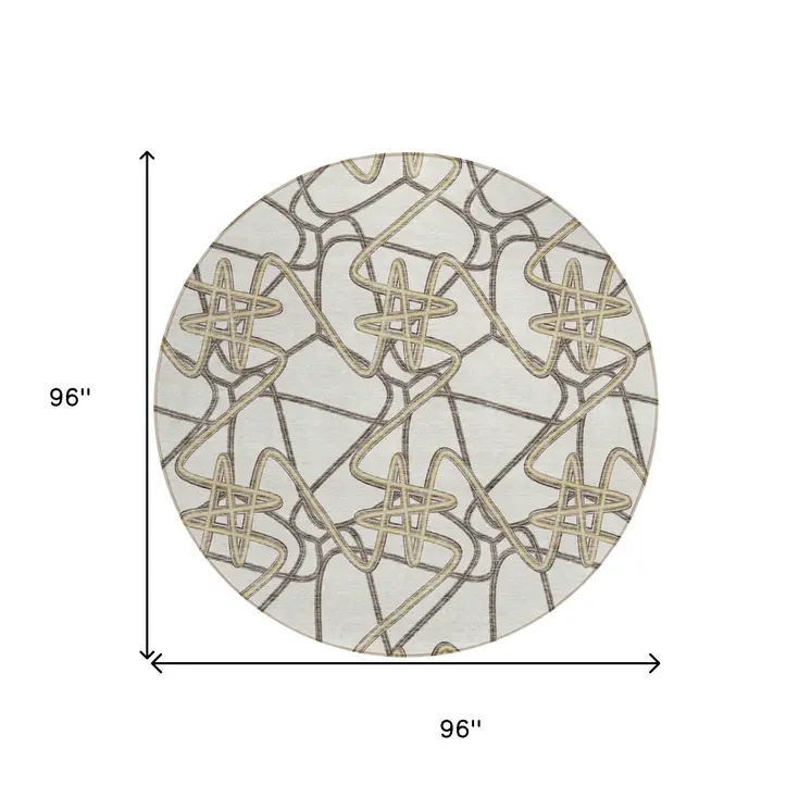 8' Ivory Charcoal And Gold Round Geometric Washable Indoor Outdoor Area Rug