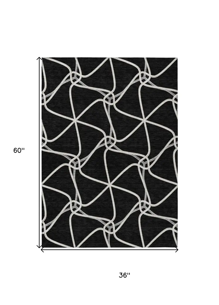 3' X 5' Black And Ivory Geometric Washable Indoor Outdoor Area Rug