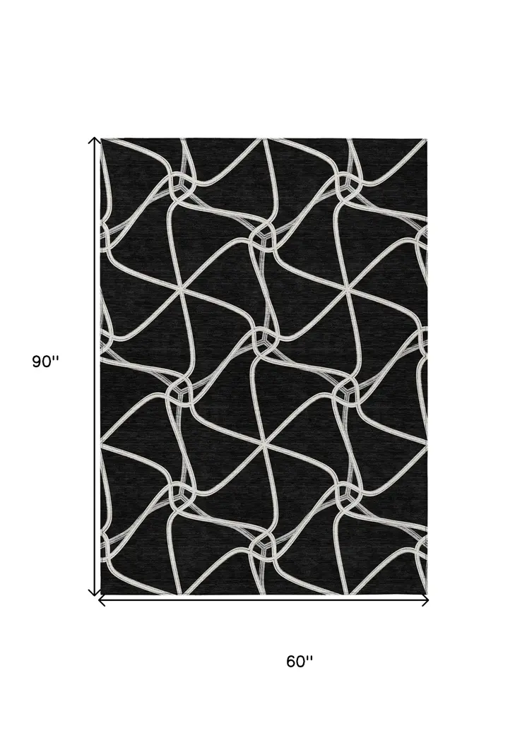 5' X 8' Black And Ivory Geometric Washable Indoor Outdoor Area Rug