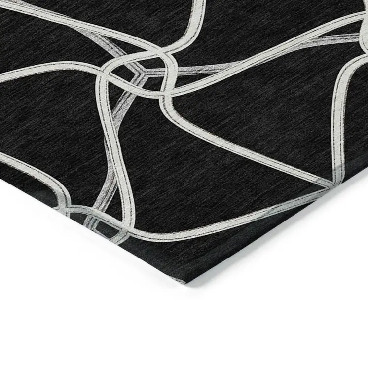 5' X 8' Black And Ivory Geometric Washable Indoor Outdoor Area Rug