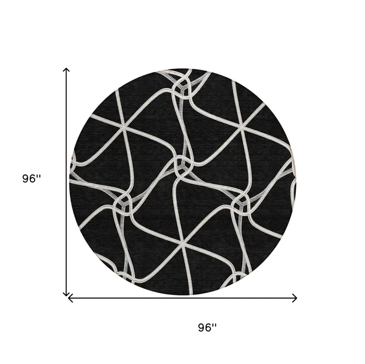 8' Black And Ivory Round Geometric Washable Indoor Outdoor Area Rug