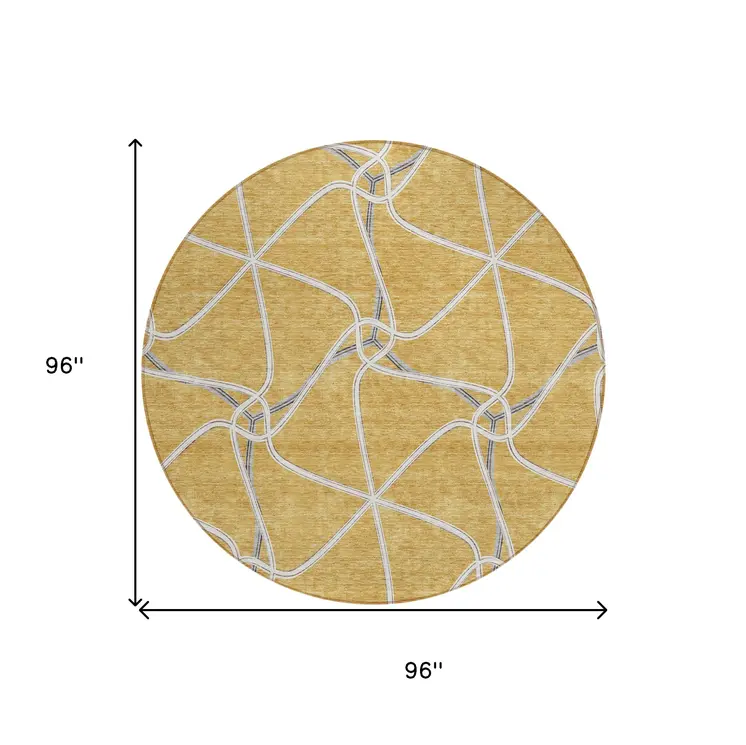 8' Gold And Ivory Round Geometric Washable Indoor Outdoor Area Rug