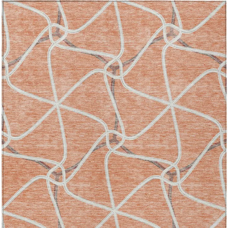 5' X 8' Salmon And Ivory Geometric Washable Indoor Outdoor Area Rug