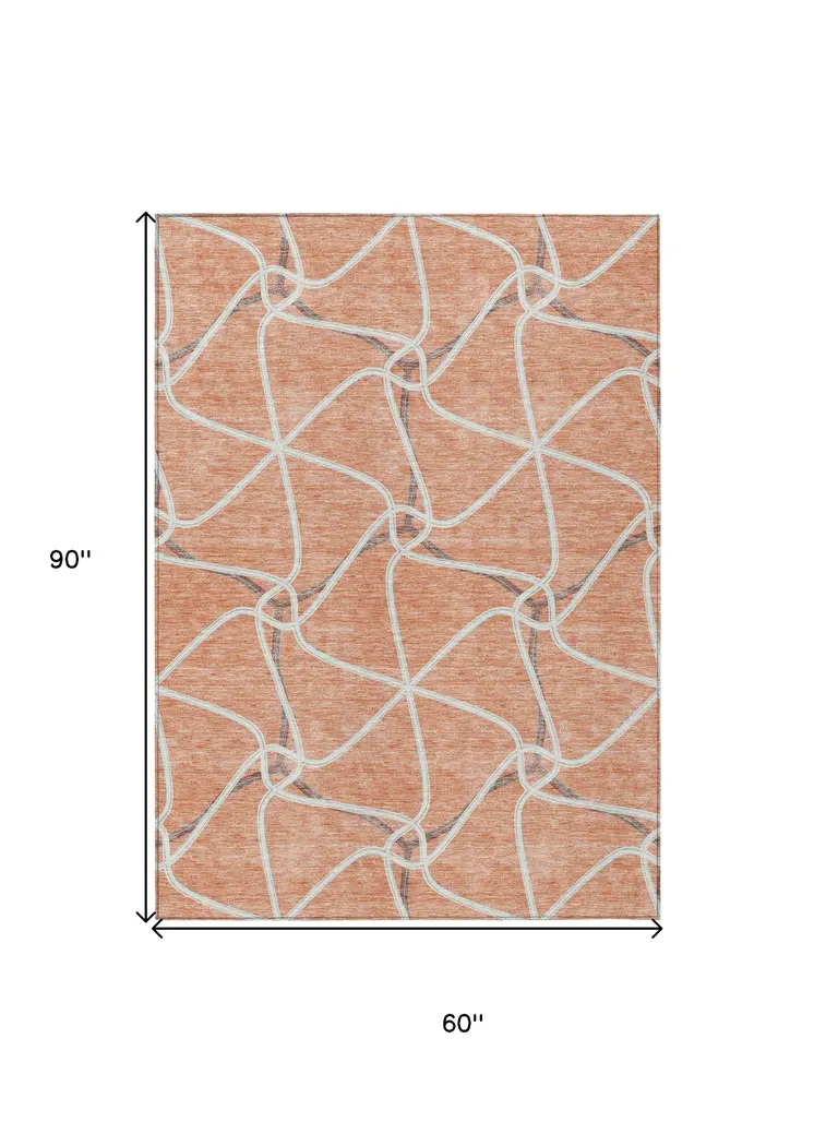 5' X 8' Salmon And Ivory Geometric Washable Indoor Outdoor Area Rug