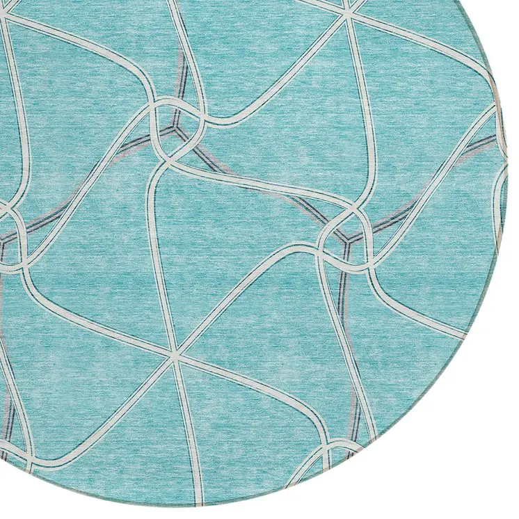 8' Teal Blue And Ivory Round Geometric Washable Indoor Outdoor Area Rug