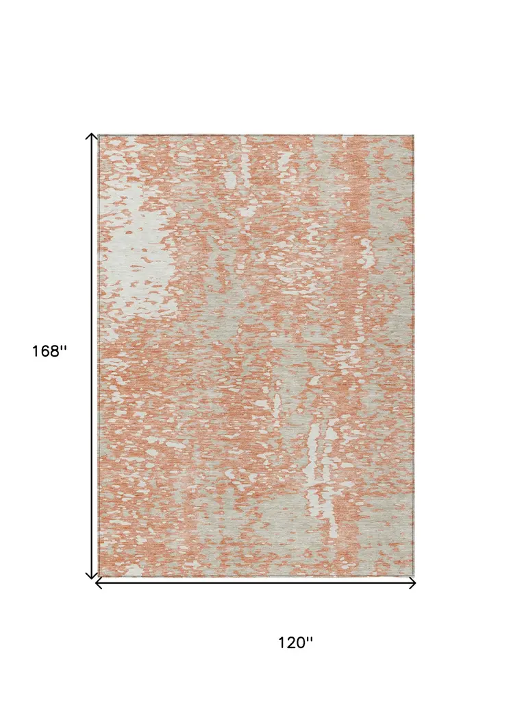 10' X 14' Coral And Ivory Abstract Washable Indoor Outdoor Area Rug