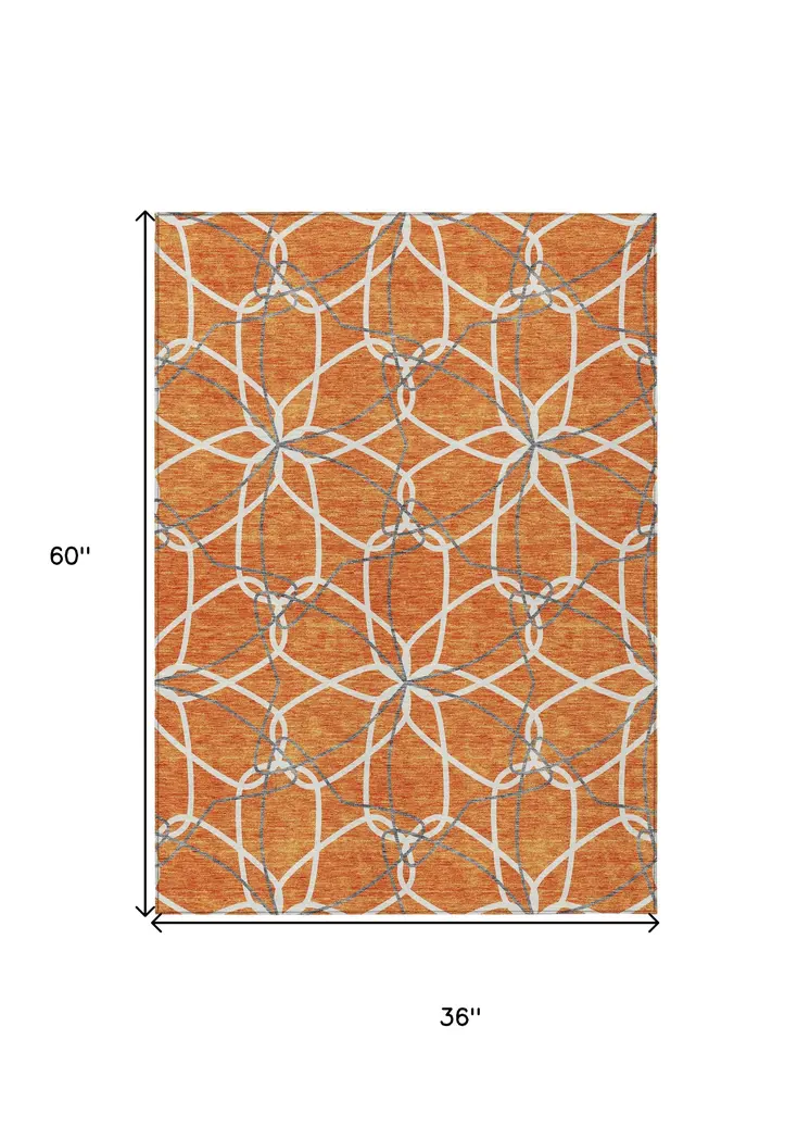 3' X 5' Orange And Ivory Geometric Washable Indoor Outdoor Area Rug