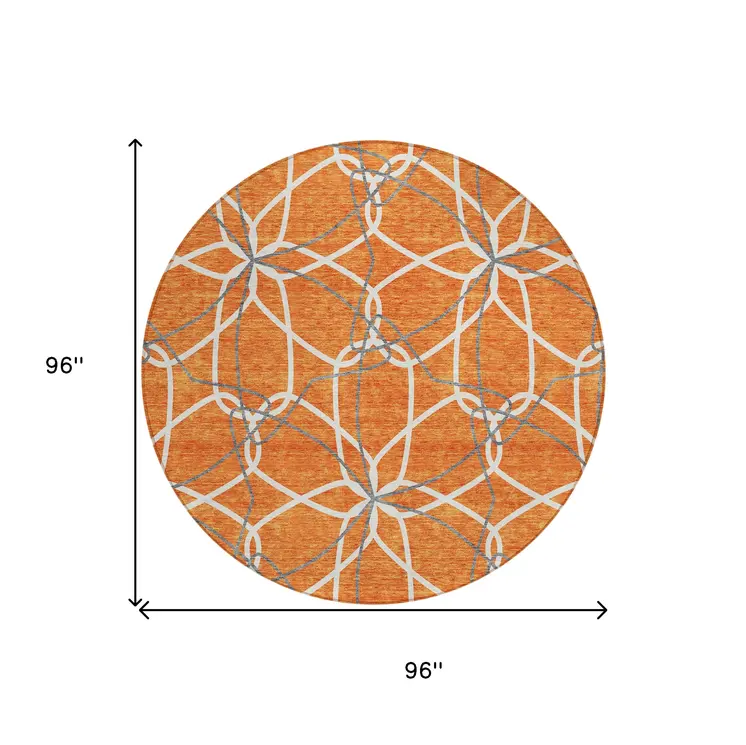 8' Orange And Ivory Round Geometric Washable Indoor Outdoor Area Rug