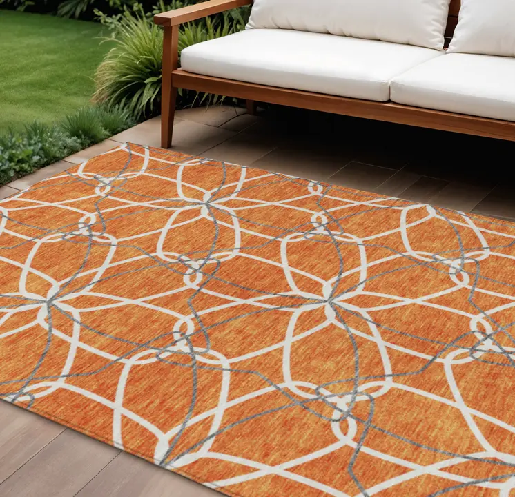 9' X 12' Orange And Ivory Geometric Washable Indoor Outdoor Area Rug