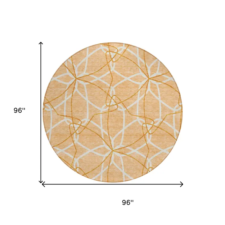 8' Peach And Ivory Round Geometric Washable Indoor Outdoor Area Rug