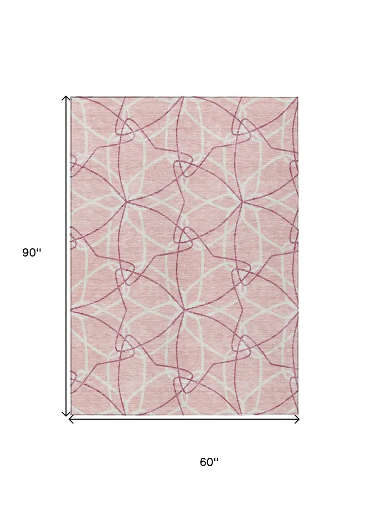 5' X 8' Pink And Ivory Geometric Washable Indoor Outdoor Area Rug