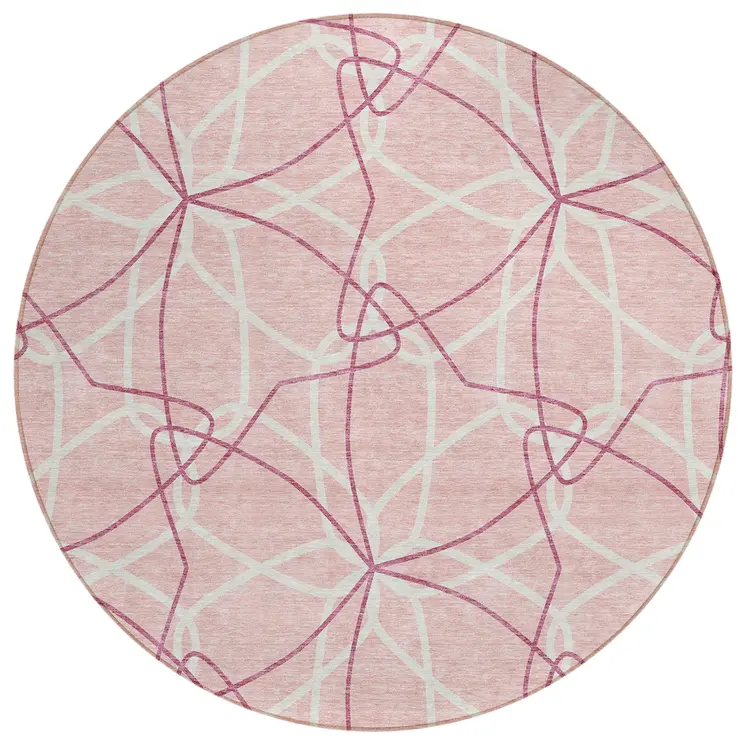 8' Pink And Ivory Round Geometric Washable Indoor Outdoor Area Rug