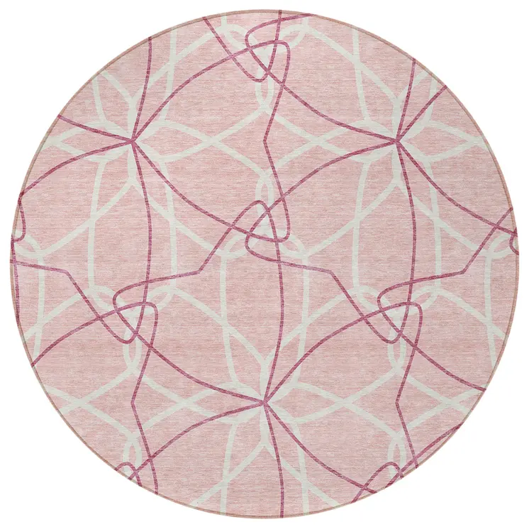 8' Pink And Ivory Round Geometric Washable Indoor Outdoor Area Rug