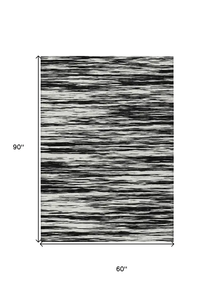 5' X 8' Black And Ivory Abstract Washable Indoor Outdoor Area Rug
