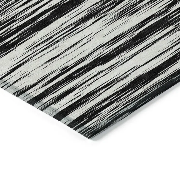 5' X 8' Black And Ivory Abstract Washable Indoor Outdoor Area Rug