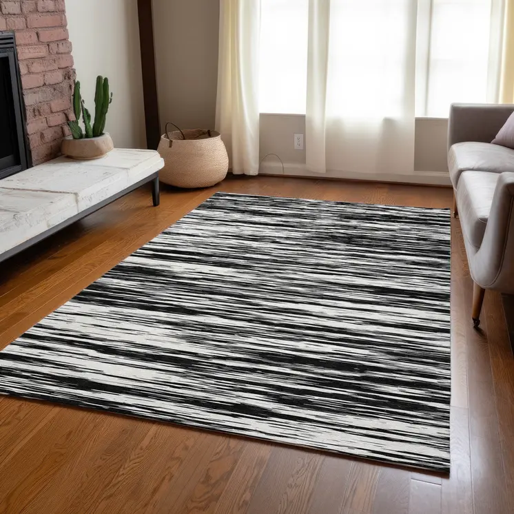 5' X 8' Black And Ivory Abstract Washable Indoor Outdoor Area Rug