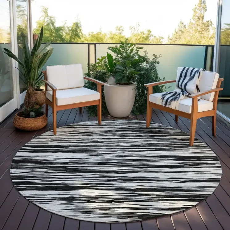 8' Black And Ivory Round Abstract Washable Indoor Outdoor Area Rug