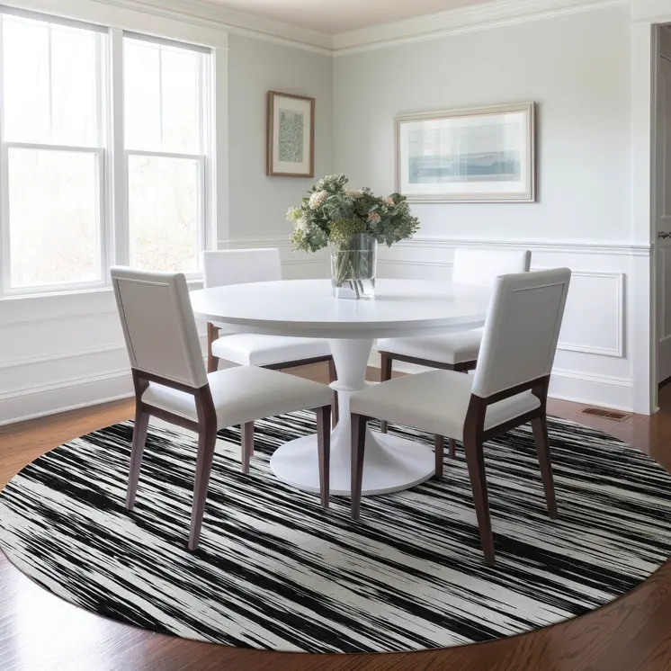 8' Black And Ivory Round Abstract Washable Indoor Outdoor Area Rug