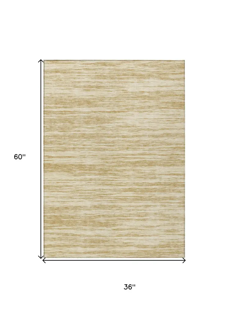 3' X 5' Gold And Ivory Abstract Washable Indoor Outdoor Area Rug