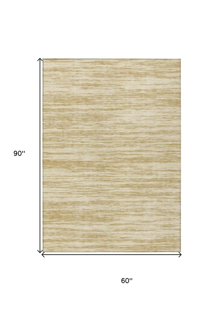 5' X 8' Gold And Ivory Abstract Washable Indoor Outdoor Area Rug