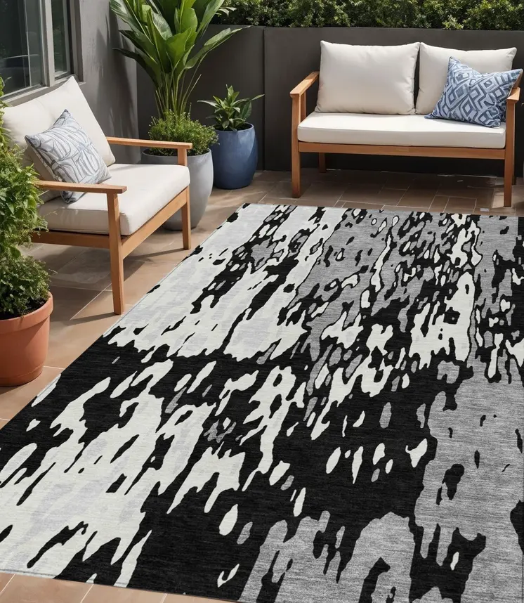 5' X 8' Black And Ivory Abstract Washable Indoor Outdoor Area Rug