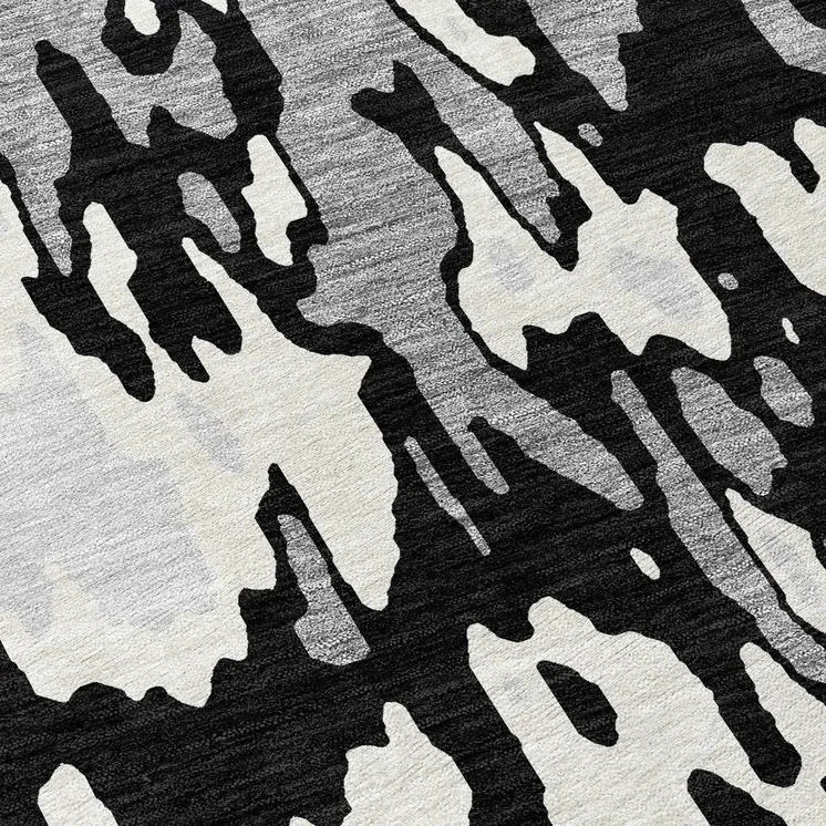 8' Black And Ivory Round Abstract Washable Indoor Outdoor Area Rug
